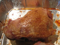 roasted turkey thigh in roasting pan