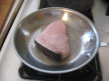 swordfish steak in skillet